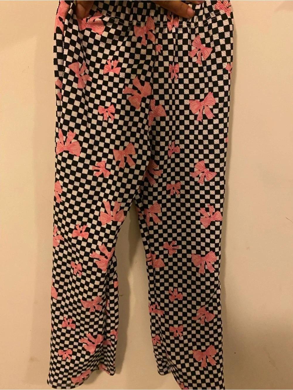 Checkerboard Pants with Pink Bow Print